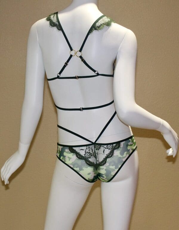 A mannequin wearing lingerie with camouflage print.