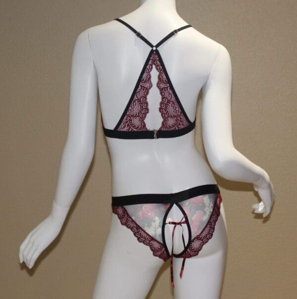 A mannequin wearing lingerie in the store.