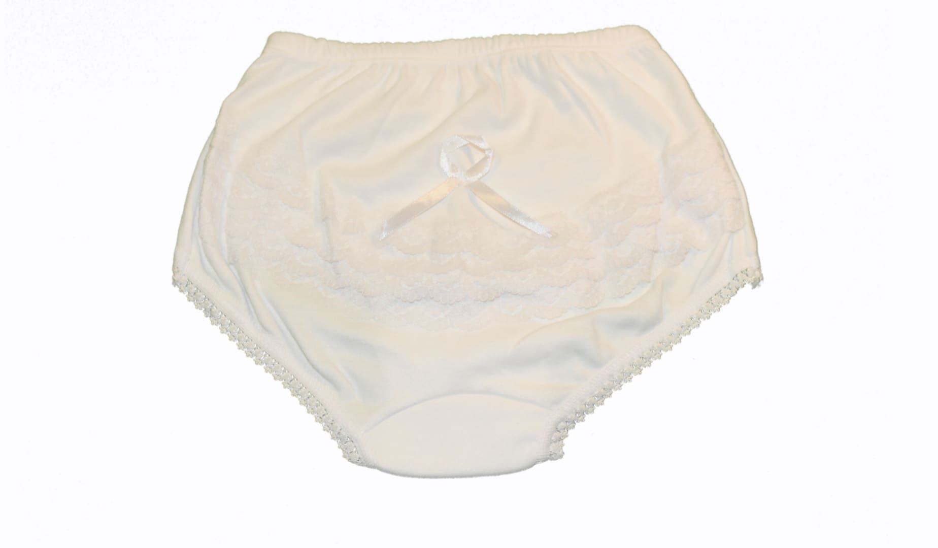 A white cloth diaper with a button on the side.