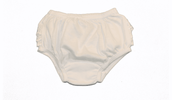 A white cloth diaper with ruffle around the bottom.