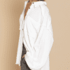A person wearing white shirt and jeans