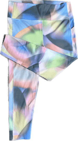 A cross made of fabric with colorful designs.