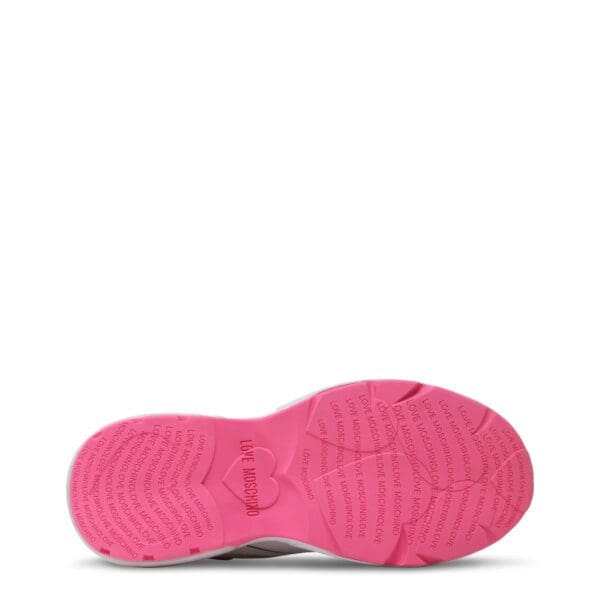 A pink shoe is shown on the bottom of a pair.