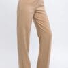 Beige wide-leg trousers on model.