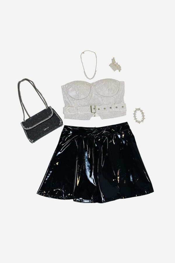 Sparkle top, black skirt, and accessories.